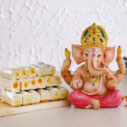 Order Raja Ganesha Idol And Kaju Rolls Buy And Send Raja Ganesha Idol